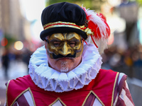 Performers in costume pose for a photo during the Columbus Day Parade in New York City, United States, on October 14, 2024. (