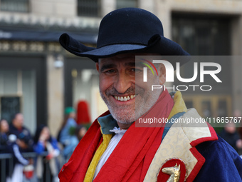 Performers in costume pose for a photo during the Columbus Day Parade in New York City, United States, on October 14, 2024. (