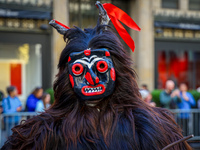 Performers in costume pose for a photo during the Columbus Day Parade in New York City, United States, on October 14, 2024. (