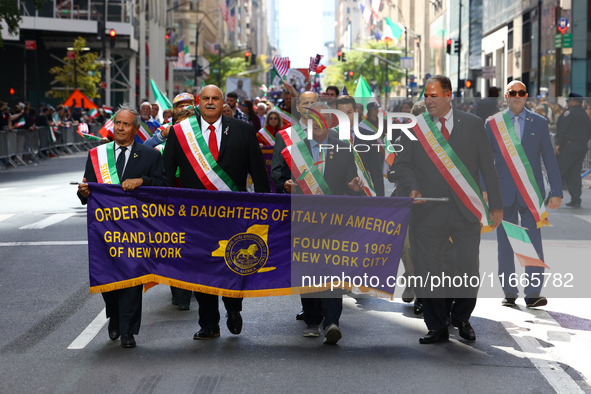 The Order Sons & Daughters of Italy in America march while heading up 5th Avenue in the Columbus Day Parade in New York City, United States,...