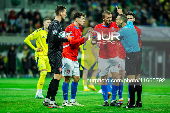 Tomas Soucek and Guillermo Cuadra are present during a UEFA Nations League match between the Ukraine and Czechia national teams in Wroclaw,...