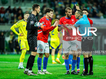 Tomas Soucek and Guillermo Cuadra are present during a UEFA Nations League match between the Ukraine and Czechia national teams in Wroclaw,...