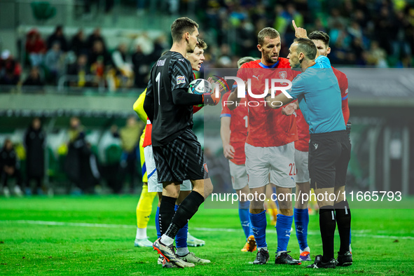 Tomas Soucek and Guillermo Cuadra are present during a UEFA Nations League match between the Ukraine and Czechia national teams in Wroclaw,...