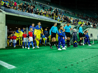 Referees officiate a match of the UEFA Nations League between the Ukraine and Czechia national teams in Wroclaw, Poland, on October 14, 2024...