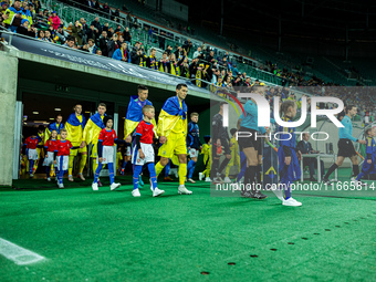 Teams play during a match of the UEFA Nations League between the Ukraine and Czechia national teams in Wroclaw, Poland, on October 14, 2024....