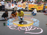 Doctors paint on the street at the protest site. Junior doctors continue their indefinite hunger strike for 211 hours, demanding justice for...