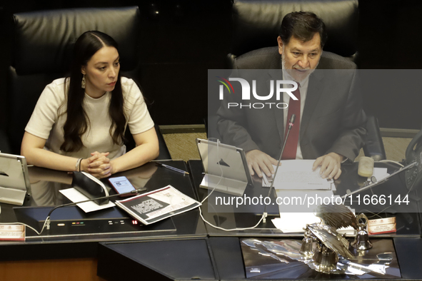 The President of the Senate of Mexico, Gerardo Fernandez Norona, and Jasmine Bugarin, Secretary of the Senate, participate in the drawing of...