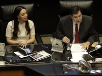 The President of the Senate of Mexico, Gerardo Fernandez Norona, and Jasmine Bugarin, Secretary of the Senate, participate in the drawing of...