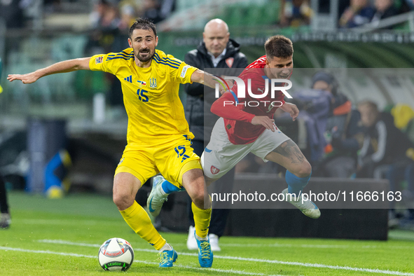 Oleksandr Svatok, Adam Hlozek are playing during the  UEFA Nations League 2024 League B Group B1 match between Ukraine and Czechia , at the...