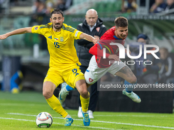 Oleksandr Svatok, Adam Hlozek are playing during the  UEFA Nations League 2024 League B Group B1 match between Ukraine and Czechia , at the...