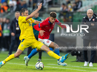 Oleksandr Svatok, Adam Hlozek are playing during the  UEFA Nations League 2024 League B Group B1 match between Ukraine and Czechia , at the...