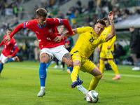 Adam Hlozek, Dmytro Kryskiv are playing during the  UEFA Nations League 2024 League B Group B1 match between Ukraine and Czechia , at the Ta...