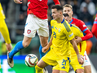 Pavel Sulc, Dmytro Kryskiv are playing during the  UEFA Nations League 2024 League B Group B1 match between Ukraine and Czechia , at the Tar...