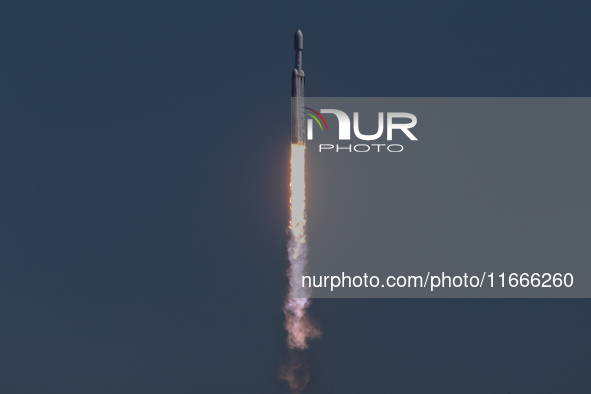 A SpaceX Falcon Heavy rocket lifts off from launch pad 39A at the Kennedy Space Center, carrying the NASA probe Europa Clipper on its way to...