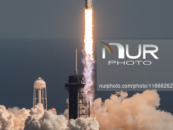 A SpaceX Falcon Heavy rocket lifts off from launch pad 39A at the Kennedy Space Center, carrying the NASA probe Europa Clipper on its way to...