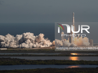 A SpaceX Falcon Heavy rocket lifts off from launch pad 39A at the Kennedy Space Center, carrying the NASA probe Europa Clipper on its way to...