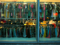 A shopper is seen in a second hand clothing shop in Warsaw, Poland on 14 October, 2024. (