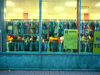 A shopper is seen in a second hand clothing shop in Warsaw, Poland on 14 October, 2024. (