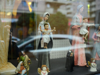 Religious sculptures are seen on display in a window display in Warsaw, Poland on 14 October, 2024. (