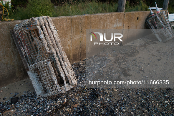 Barnacle-covered and decaying lobster traps, locally known as lobster pots. 