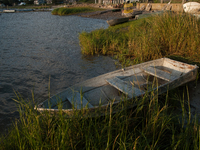 All of the fishermen here use small boats to tend to and harvest their shellfish farms (