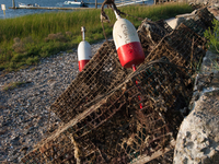 Stacked lobster traps, locally known as lobster pots, are ready for use. (