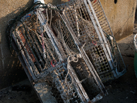 Barnacle-covered and decaying lobster traps, locally known as lobster pots. (