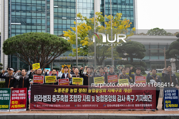 Members of the National Financial and Service Labor Union gather outside the main office of the National Agricultural Cooperative Federation...