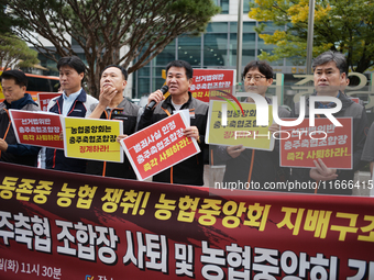 Members of the National Financial and Service Labor Union gather outside the main office of the National Agricultural Cooperative Federation...