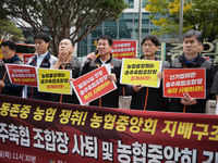 Members of the National Financial and Service Labor Union gather outside the main office of the National Agricultural Cooperative Federation...