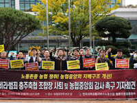 Members of the National Financial and Service Labor Union gather outside the main office of the National Agricultural Cooperative Federation...