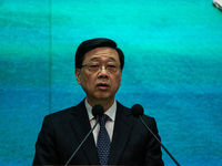 Hong Kong Chief Executive John Lee speaks at a press conference before his Executive Council meeting in Hong Kong, China, on October 15, 202...