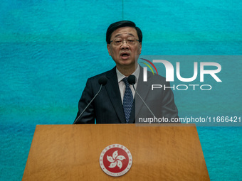 Hong Kong Chief Executive John Lee speaks at a press conference before his Executive Council meeting in Hong Kong, China, on October 15, 202...