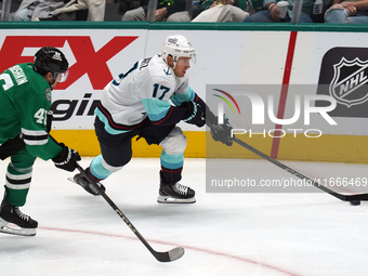 Jaden Schwartz #17 of the Seattle Kraken skates on the ice while controlling the puck during the NHL match between the Dallas Stars and the...