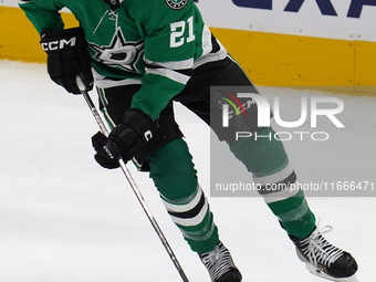 Jason Robertson #21 of the Dallas Stars controls the puck during the NHL match between the Dallas Stars and the Seattle Kraken at American A...