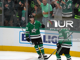 Wyatt Johnston #53 of the Dallas Stars celebrates after scoring a goal during the NHL match between the Dallas Stars and the Seattle Kraken...