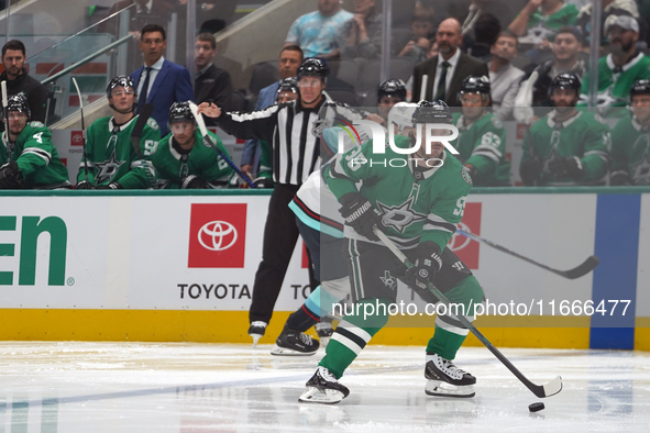 Matt Duchene #95 of the Dallas Stars skates on the ice with the puck during the NHL match between the Dallas Stars and the Seattle Kraken at...