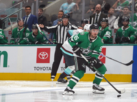 Matt Duchene #95 of the Dallas Stars skates on the ice with the puck during the NHL match between the Dallas Stars and the Seattle Kraken at...