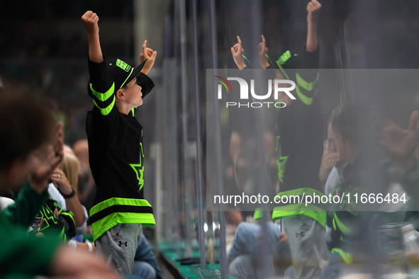 A Dallas Stars child fan attends the NHL match between the Dallas Stars and the Seattle Kraken at the American Airlines Center in Dallas, Te...