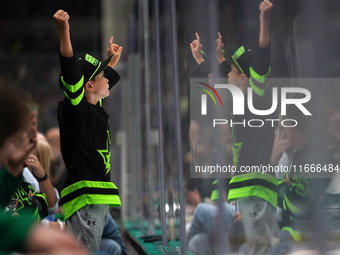 A Dallas Stars child fan attends the NHL match between the Dallas Stars and the Seattle Kraken at the American Airlines Center in Dallas, Te...