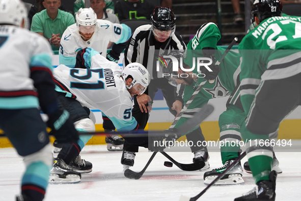 Tyler Seguin #91 of the Dallas Stars and Shane Wright #51 of the Seattle Kraken line up against one another during the NHL match between the...