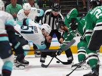 Tyler Seguin #91 of the Dallas Stars and Shane Wright #51 of the Seattle Kraken line up against one another during the NHL match between the...