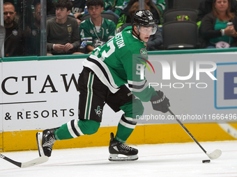 Wyatt Johnston #53 of the Dallas Stars skates on the ice with the puck during the NHL match between the Dallas Stars and the Seattle Kraken...