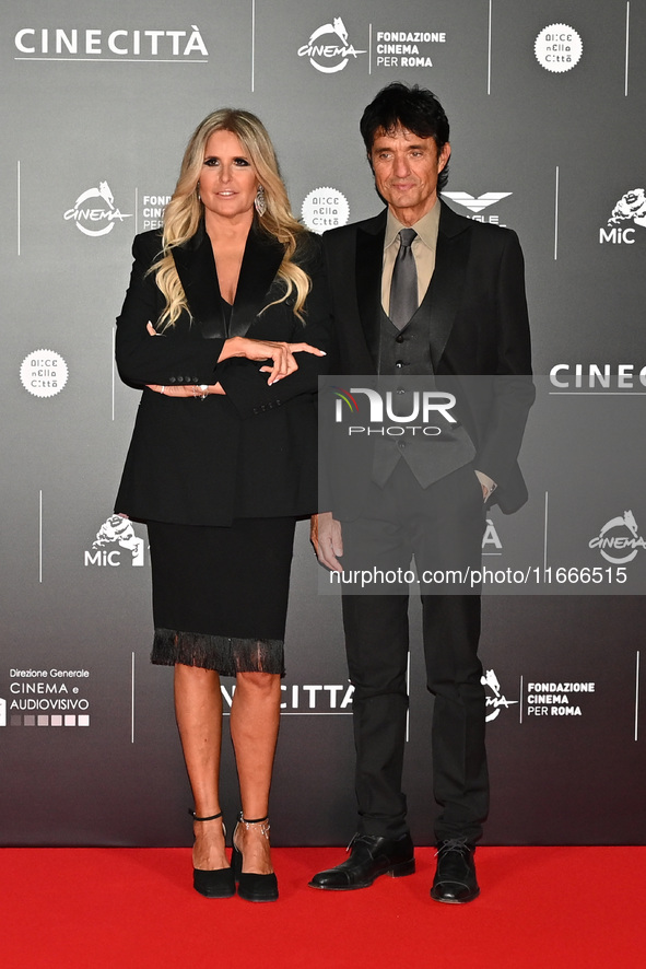 Tiziana Rocca and Giulio Base attend the red carpet for the film Megalopolis at Cinecitta Studios in Rome, Italy, on October 14, 2024. 