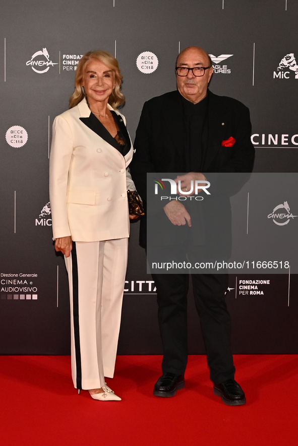 Francesca Lo Schiavo and Dante Ferretti attend the red carpet for the film Megalopolis at Cinecitta Studios in Rome, Italy, on October 14, 2...