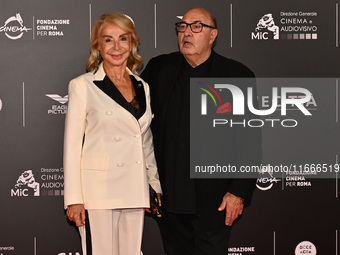 Francesca Lo Schiavo and Dante Ferretti attend the red carpet for the film Megalopolis at Cinecitta Studios in Rome, Italy, on October 14, 2...