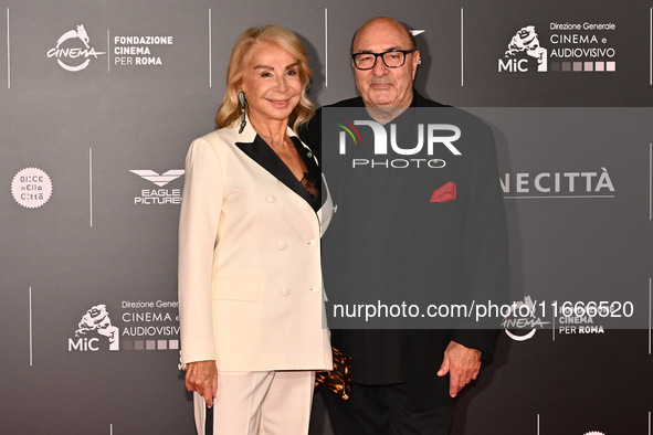 Francesca Lo Schiavo and Dante Ferretti attend the red carpet for the film Megalopolis at Cinecitta Studios in Rome, Italy, on October 14, 2...