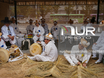 Traditional musicians take a break during the reenactment of the Dangjin Gijisi Tug-of-War, as part of the '2025-2026 Visit Chungnam Year' p...