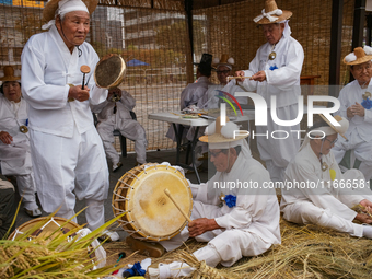 Traditional musicians take a break during the reenactment of the Dangjin Gijisi Tug-of-War, as part of the '2025-2026 Visit Chungnam Year' p...