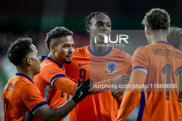 Netherlands player Devyne Rensch and Netherlands player Emmanuel Emegha participate in the match between Netherlands U21 and Sweden U21 at t...